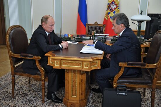 Vladimir Putin meets with Sergei Shoigu