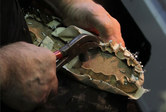 Master shoemaker of Bolshoi Theater at work