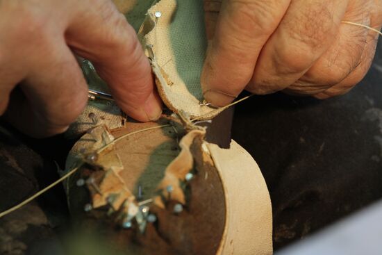Master shoemaker of Bolshoi Theater at work