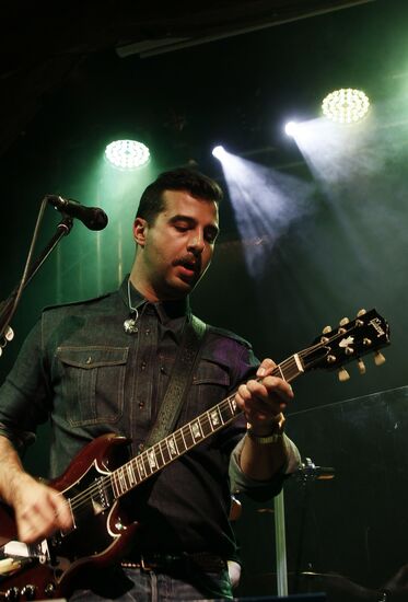 "Evening by the Fireplace" with Grisha Urgant