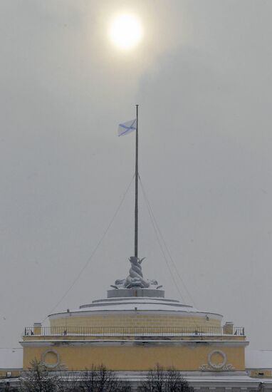 Raising Andreevsky flag on spire of Admiralty in St. Petersburg
