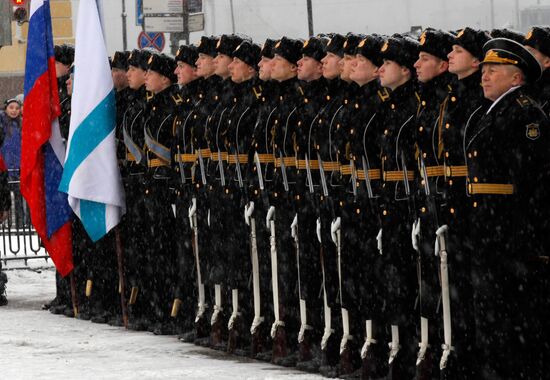 Raising Andreevsky flag on spire of Admiralty in St. Petersburg