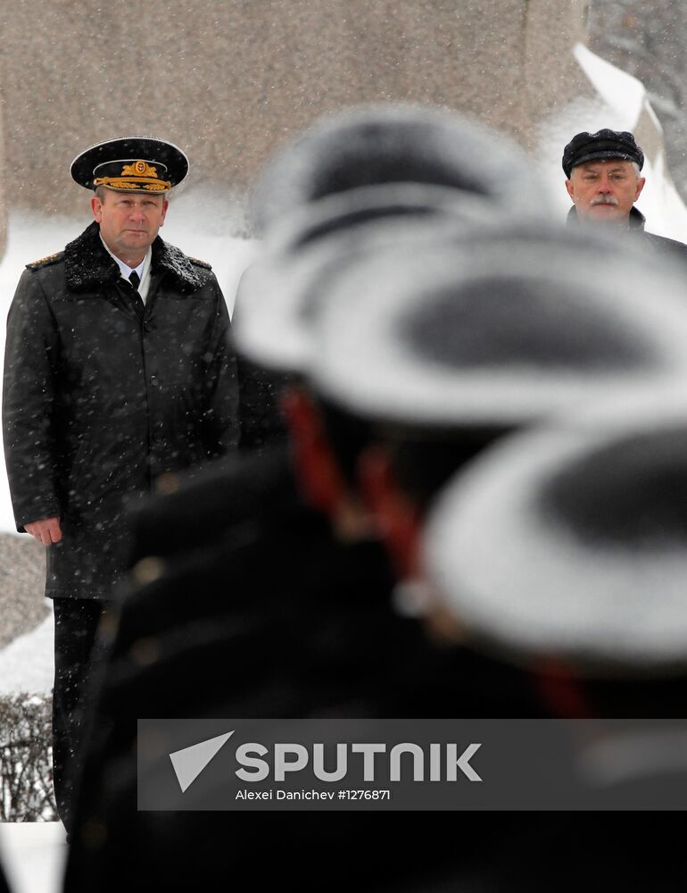 Raising Andreevsky flag in spire of Admiralty in St. Peterburg