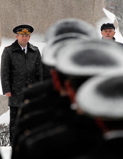 Raising Andreevsky flag in spire of Admiralty in St. Peterburg