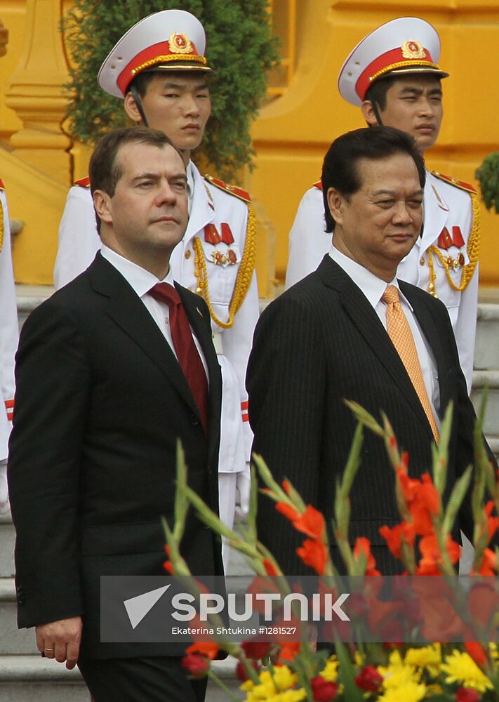 November 7, 2012. Russian Prime Minister Dmitry Medvedev, left, and Vietnamese Prime Minister Nguyen Tan Dung during the official welcoming ceremony at the square in front of the Presidential Palace in Hanoi. Location: Vietnam, Hanoi. Author: Ekaterina Shtukina/Sputnik. Dmitry Medvedev's official visit to Vietnam