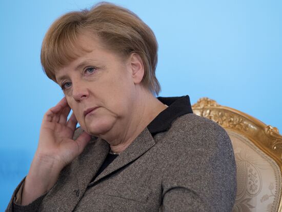 Vladimir Putin, Angela Merkel at St. Petersburg Dialogue Forum
