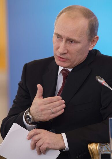 Vladimir Putin and Angela Merkel at St. Petersburg Dialog Forum