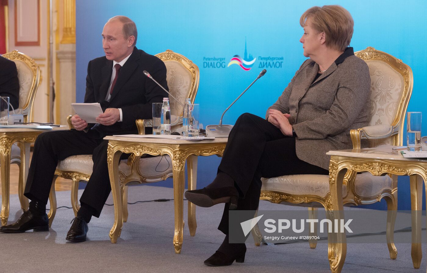 Vladimir Putin, Angela Merkel at St. Petersburg Dialogue Forum