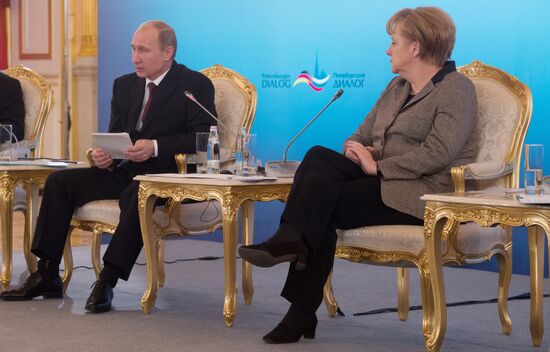 Vladimir Putin, Angela Merkel at St. Petersburg Dialogue Forum