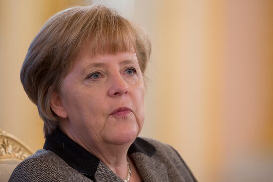 Vladimir Putin, Angela Merkel at St. Petersburg Dialogue Forum