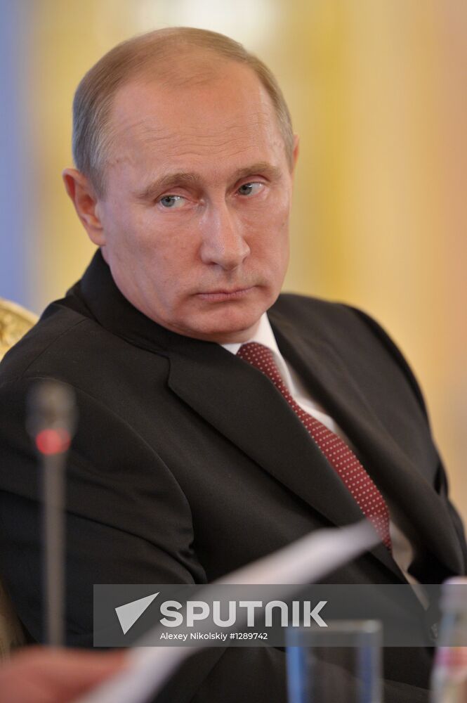 Vladimir Putin and Angela Merkel at 12th Petersburg Dialog