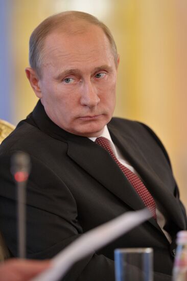 Vladimir Putin and Angela Merkel at 12th Petersburg Dialog