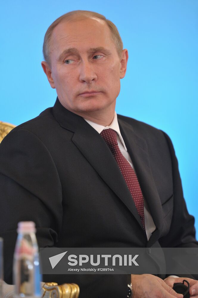 Vladimir Putin and Angela Merkel at St. Petersburg Dialog Forum