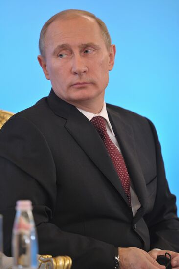 Vladimir Putin and Angela Merkel at St. Petersburg Dialog Forum