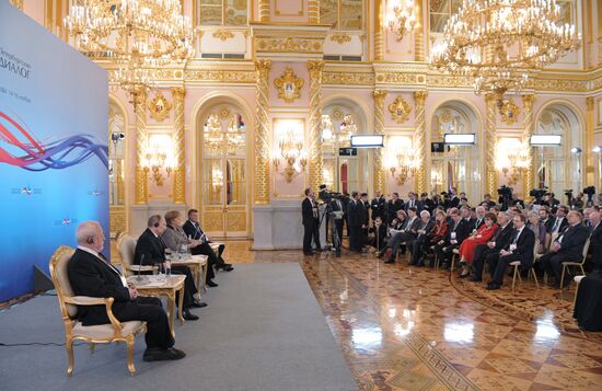 Vladimir Putin and Angela Merkel at 12th Petersburg Dialog