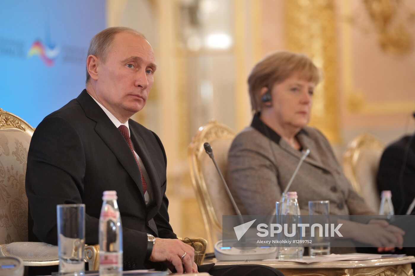 Vladimir Putin and Angela Merkel at 12th Petersburg Dialog