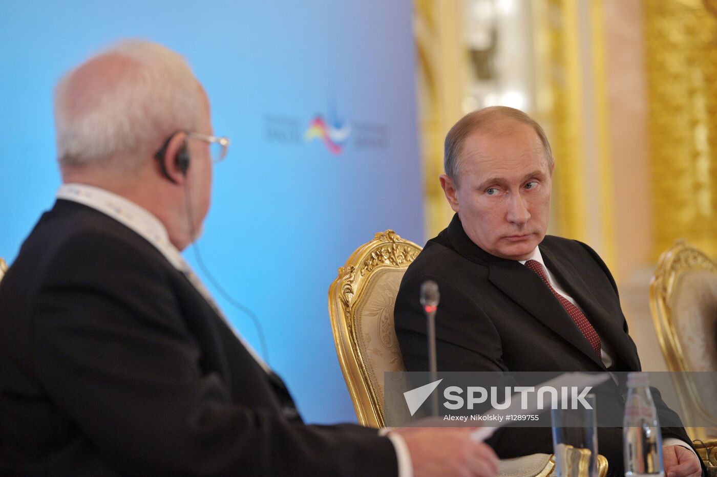 Vladimir Putin and Angela Merkel at 12th Petersburg Dialog