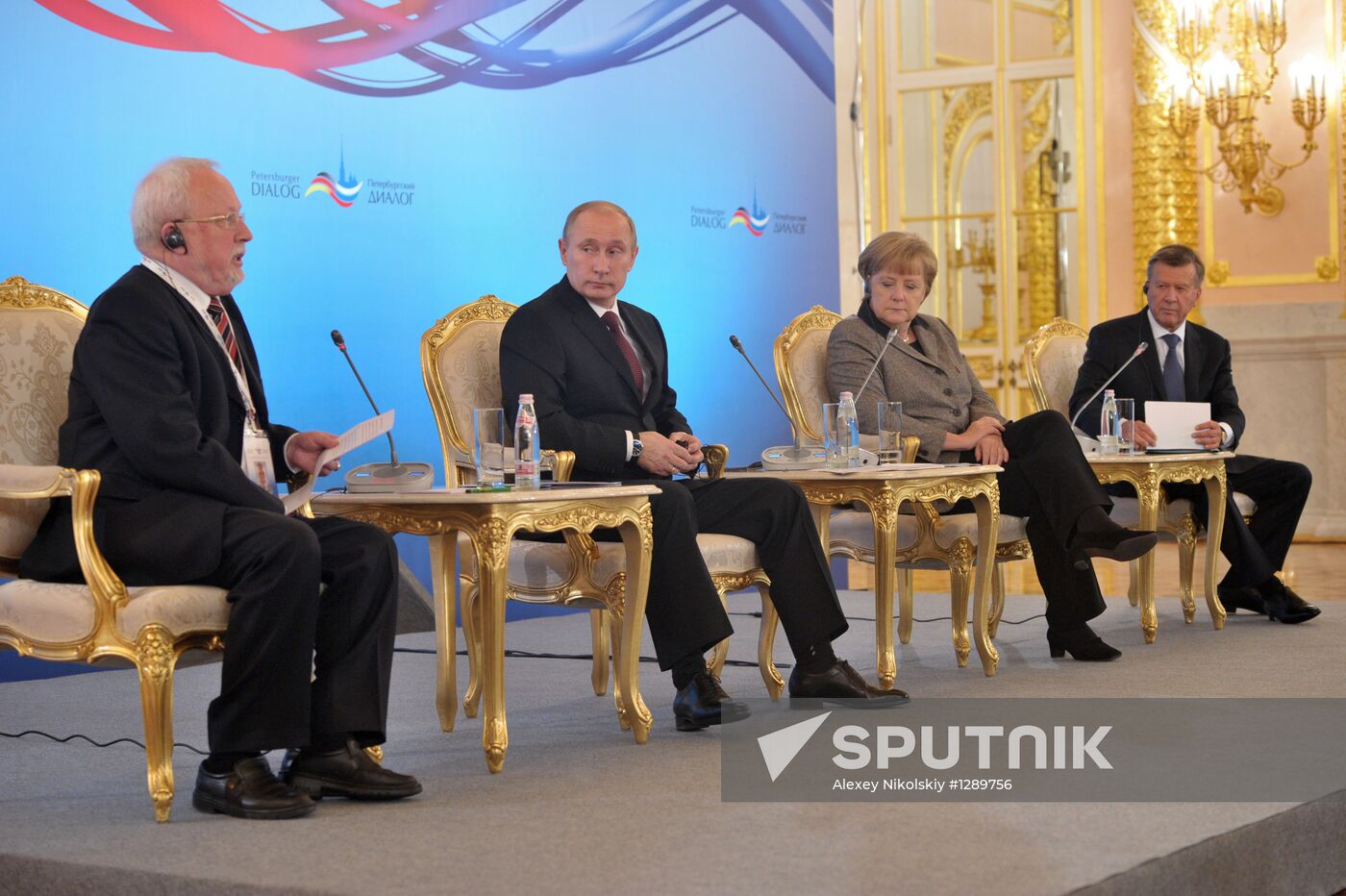 Vladimir Putin and Angela Merkel at 12th Petersburg Dialog