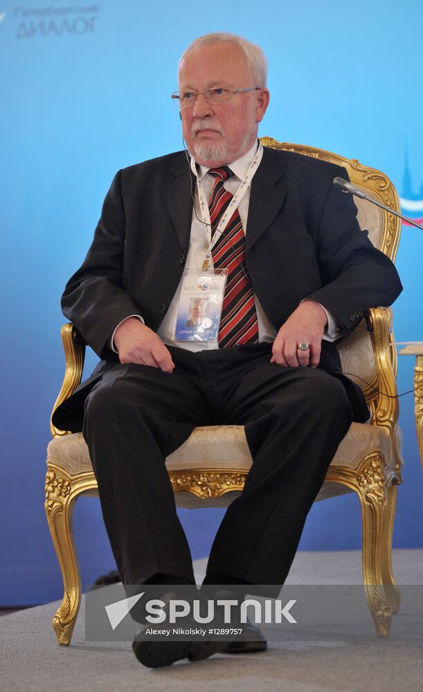 Vladimir Putin and Angela Merkel at 12th Petersburg Dialog