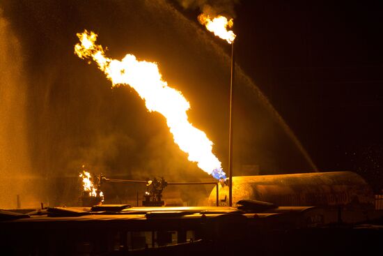 Large fire engulfs parking lot in Tver