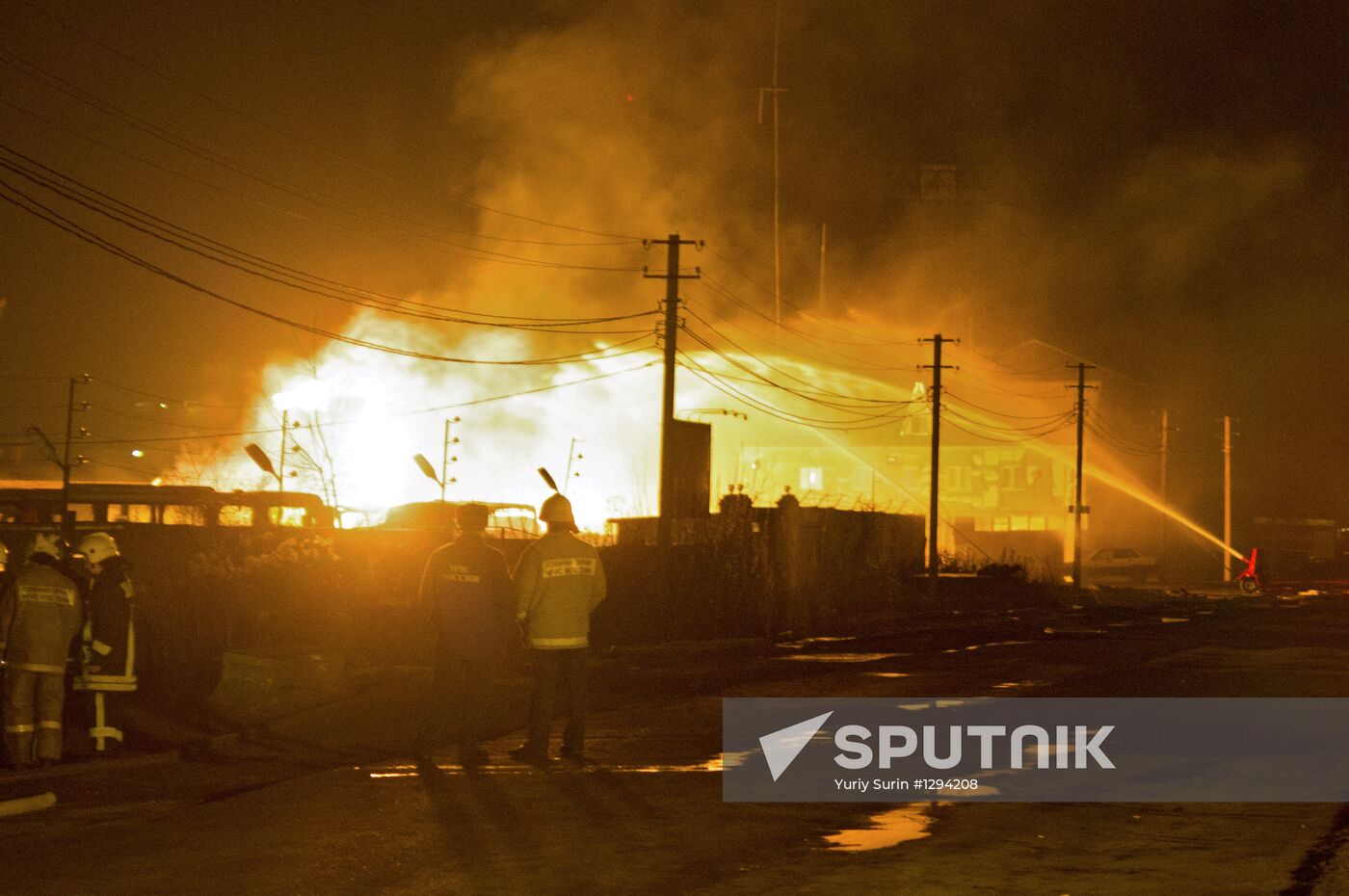 Large fire engulfs parking lot in Tver