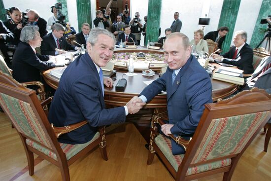 FIRST WORKING MEETING OF G8 LEADERS 