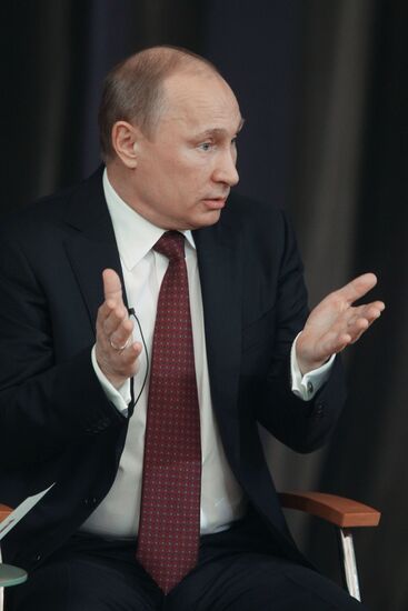 President Vladimir Putin meets with his representatives