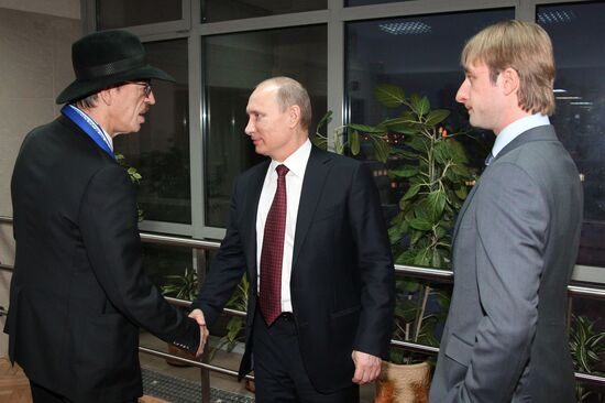 Russian President Vladimir Putin meets with his representatives
