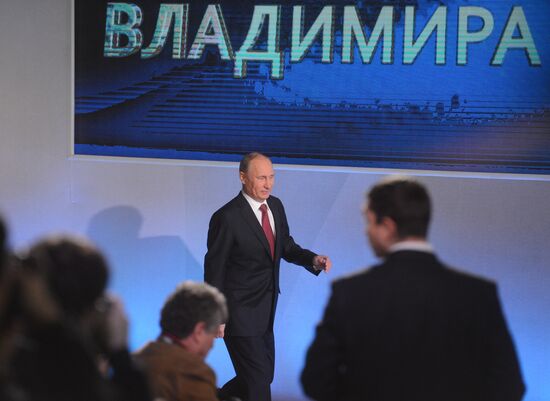 Vladimir Putin gives news conference