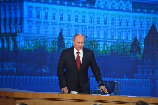 Vladimir Putin gives news conference