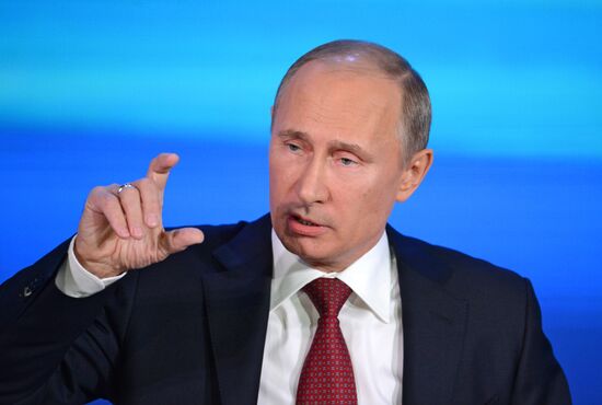 Vladimir Putin gives news conference