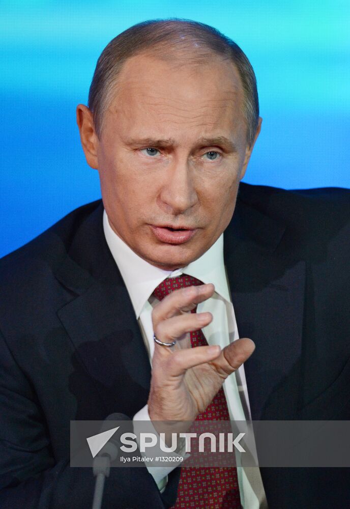 Vladimir Putin gives news conference