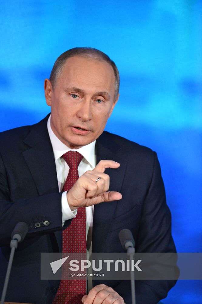 Vladimir Putin gives news conference