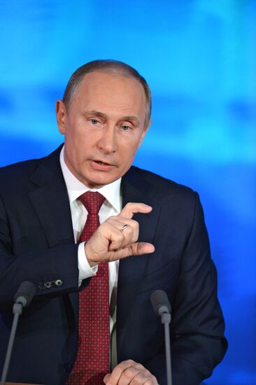 Vladimir Putin gives news conference