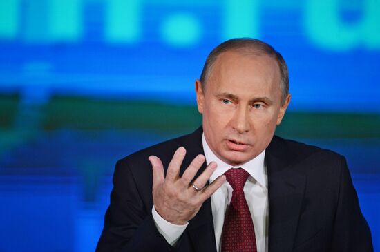 Vladimir Putin gives news conference