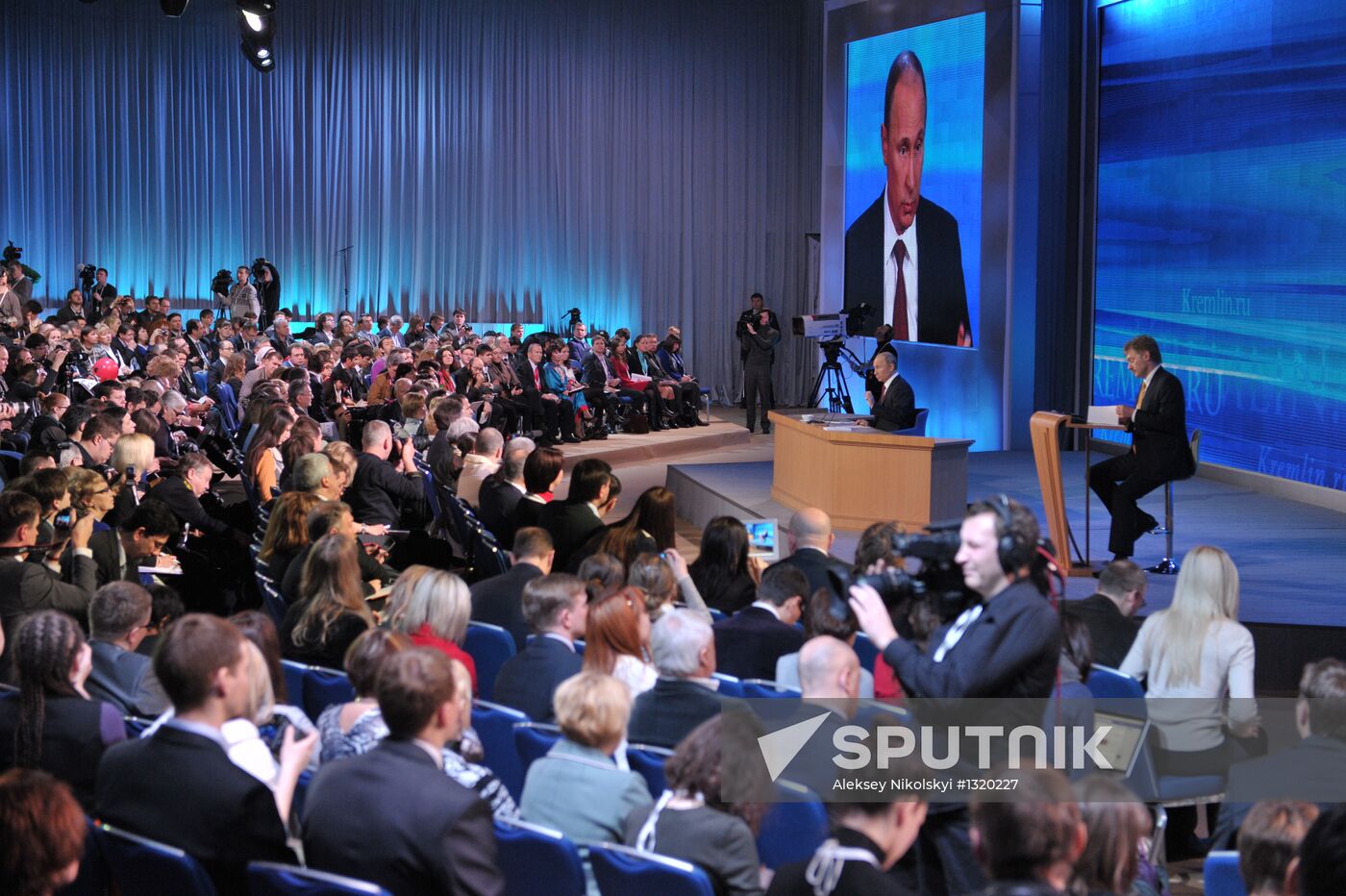 Russian President Vladimir Putin, right, answers journalists' questions during his annual big news conference at the International Trade Center in Krasnaya Presnya, 20 December 2012. Location: Russia, Moscow. Author: Aleksey Nikolskyi/Sputnik. Vladimir Putin gives news conference