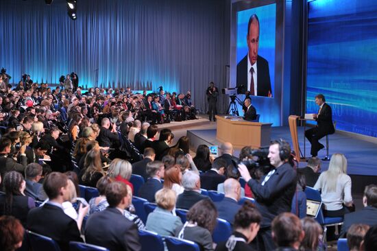 Vladimir Putin gives news conference