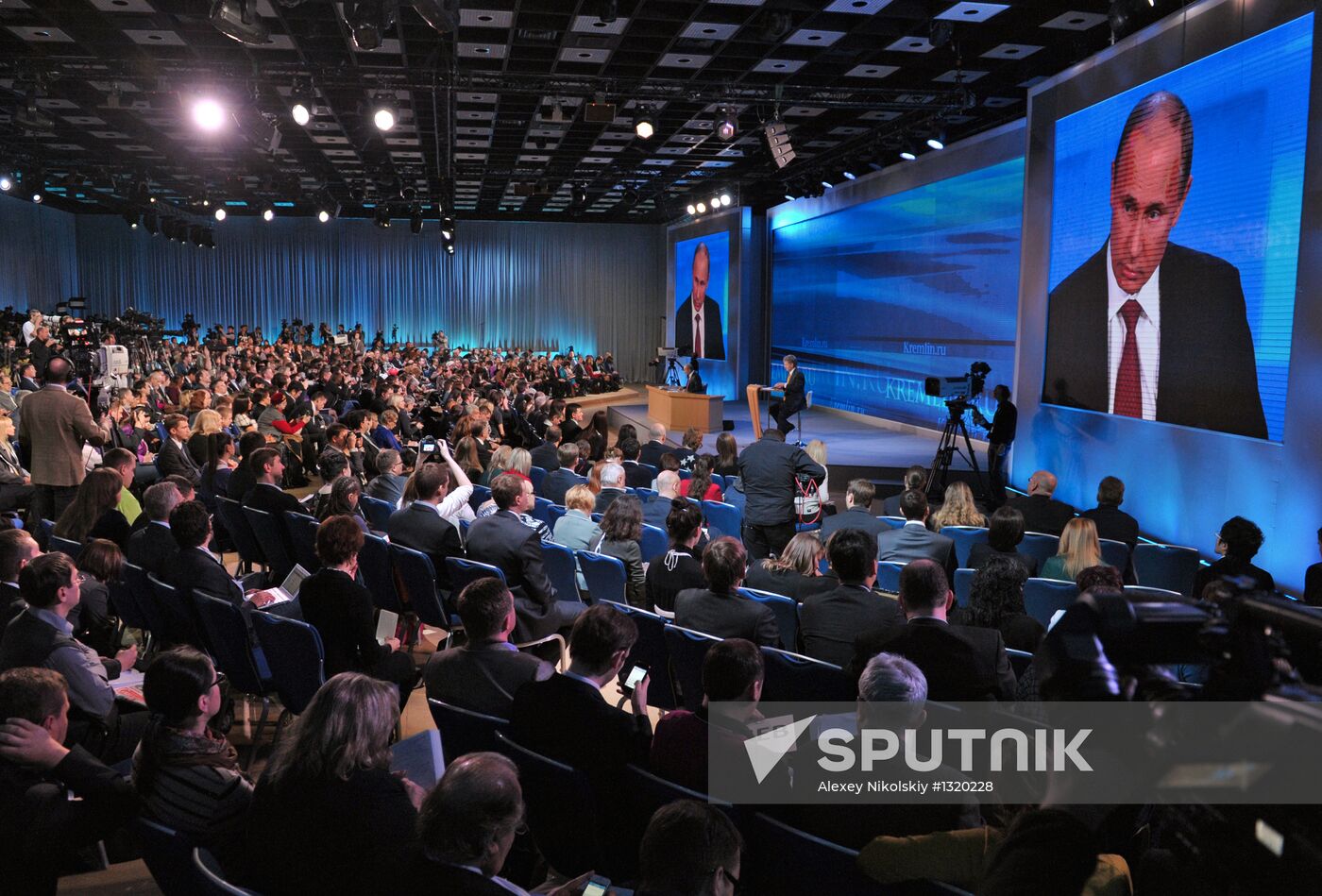 Vladimir Putin gives news conference