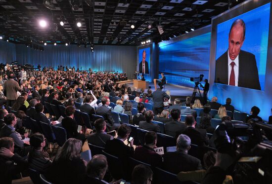 Vladimir Putin gives news conference
