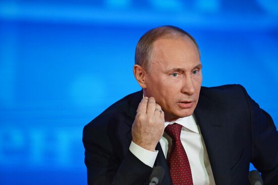 Vladimir Putin gives news conference