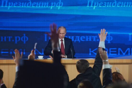 Vladimir Putin gives news conference