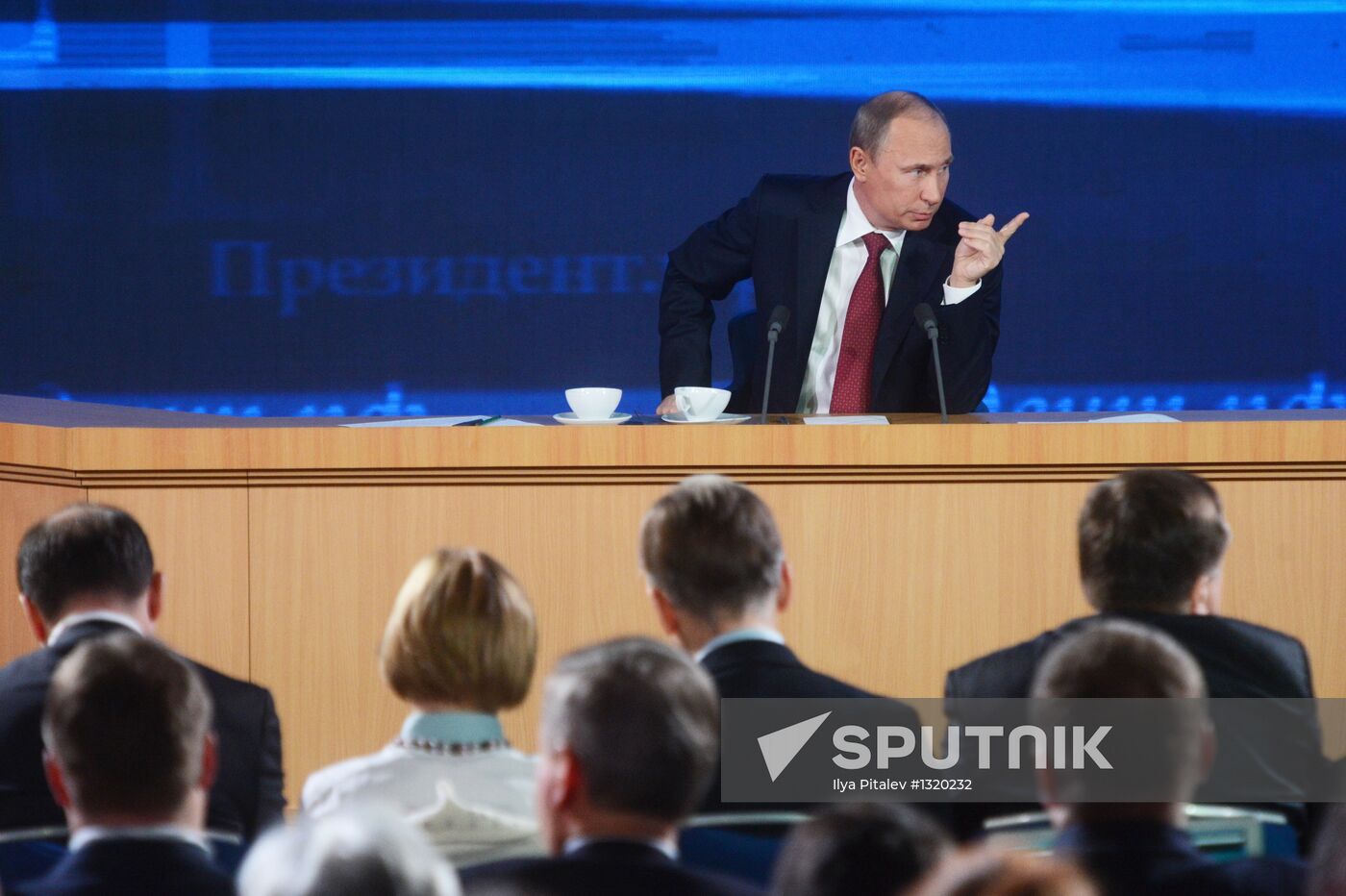 Vladimir Putin gives news conference