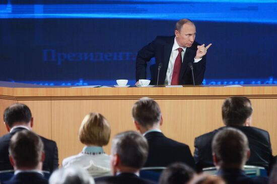 Vladimir Putin gives news conference