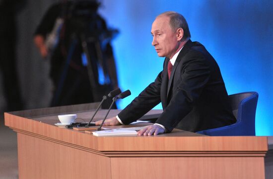 Vladimir Putin gives news conference