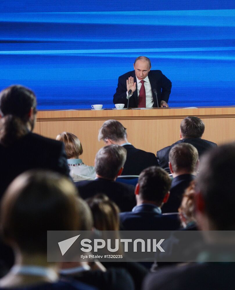 Vladimir Putin gives news conference