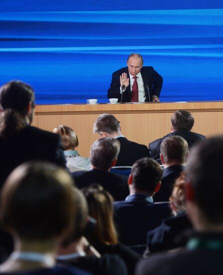 Vladimir Putin gives news conference