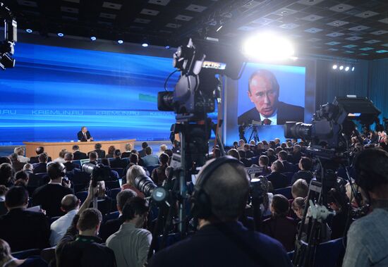 Vladimir Putin gives news conference