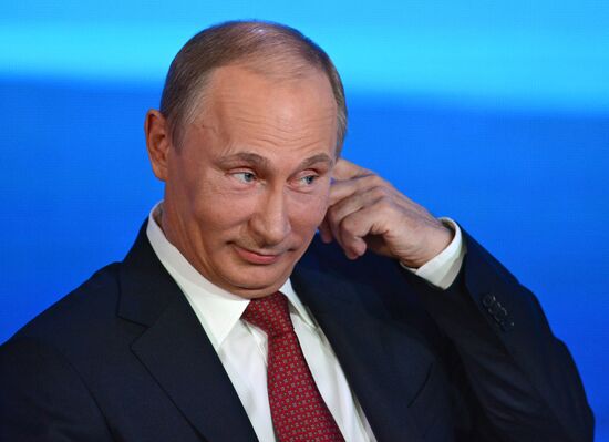 Vladimir Putin gives news conference