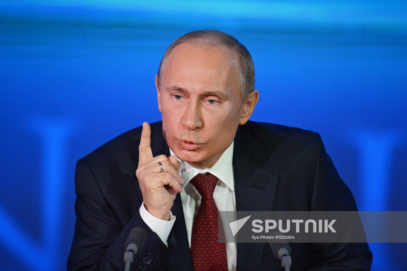 Vladimir Putin gives news conference