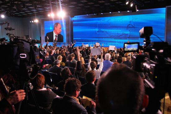 Vladimir Putin gives news conference